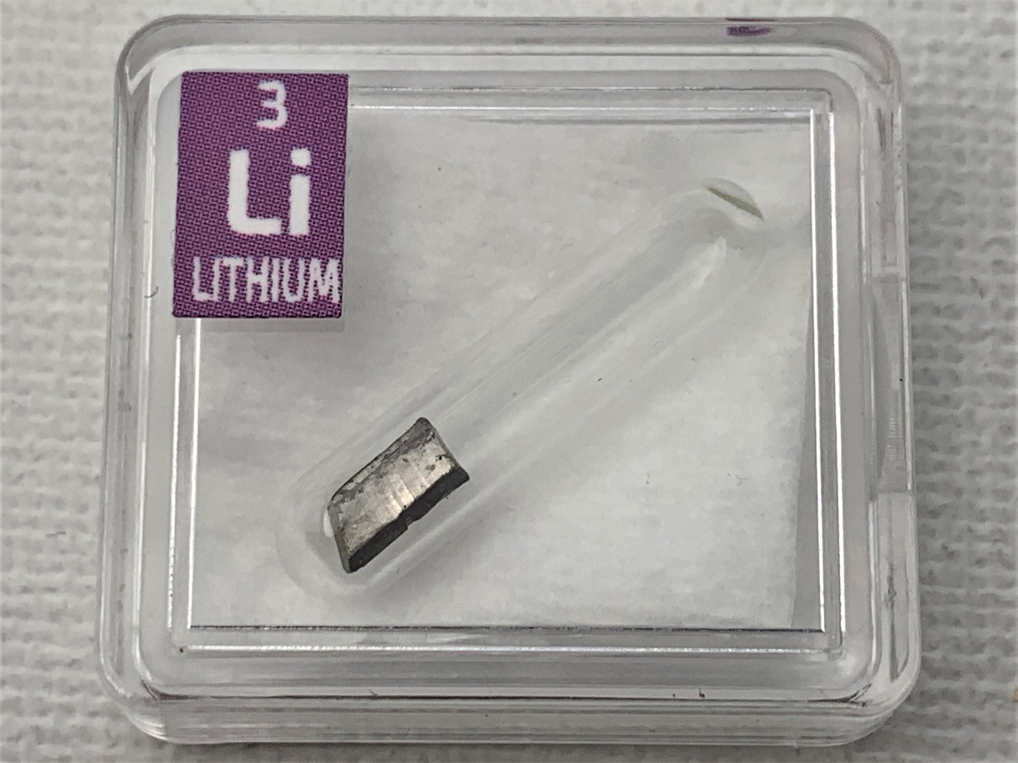 Lithium Metal in Glass ampoule under argon, Clean and Shiny 99.99% in a Periodic Element Tile