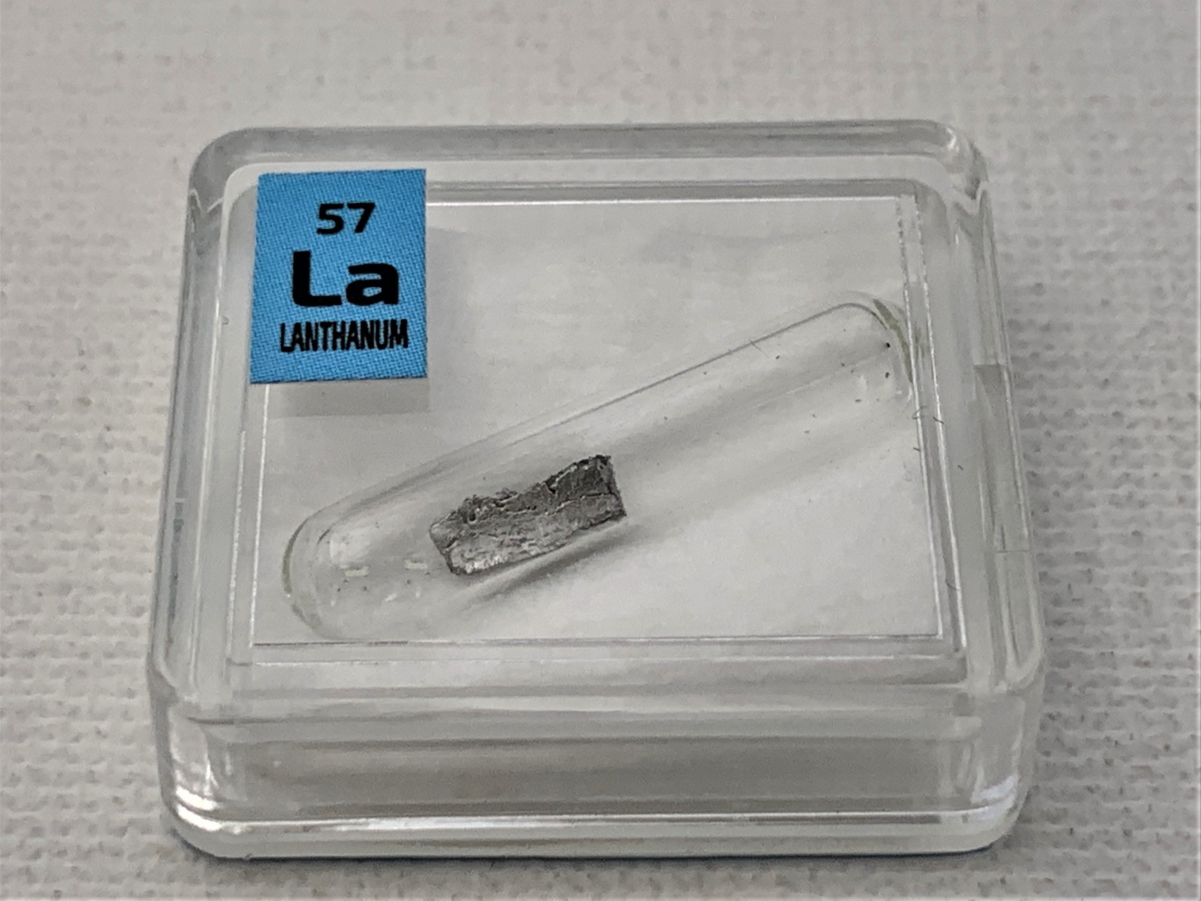 Lanthanum Metal in Glass ampoule under argon, Clean and Shiny  99.9% in a Periodic Element Tile