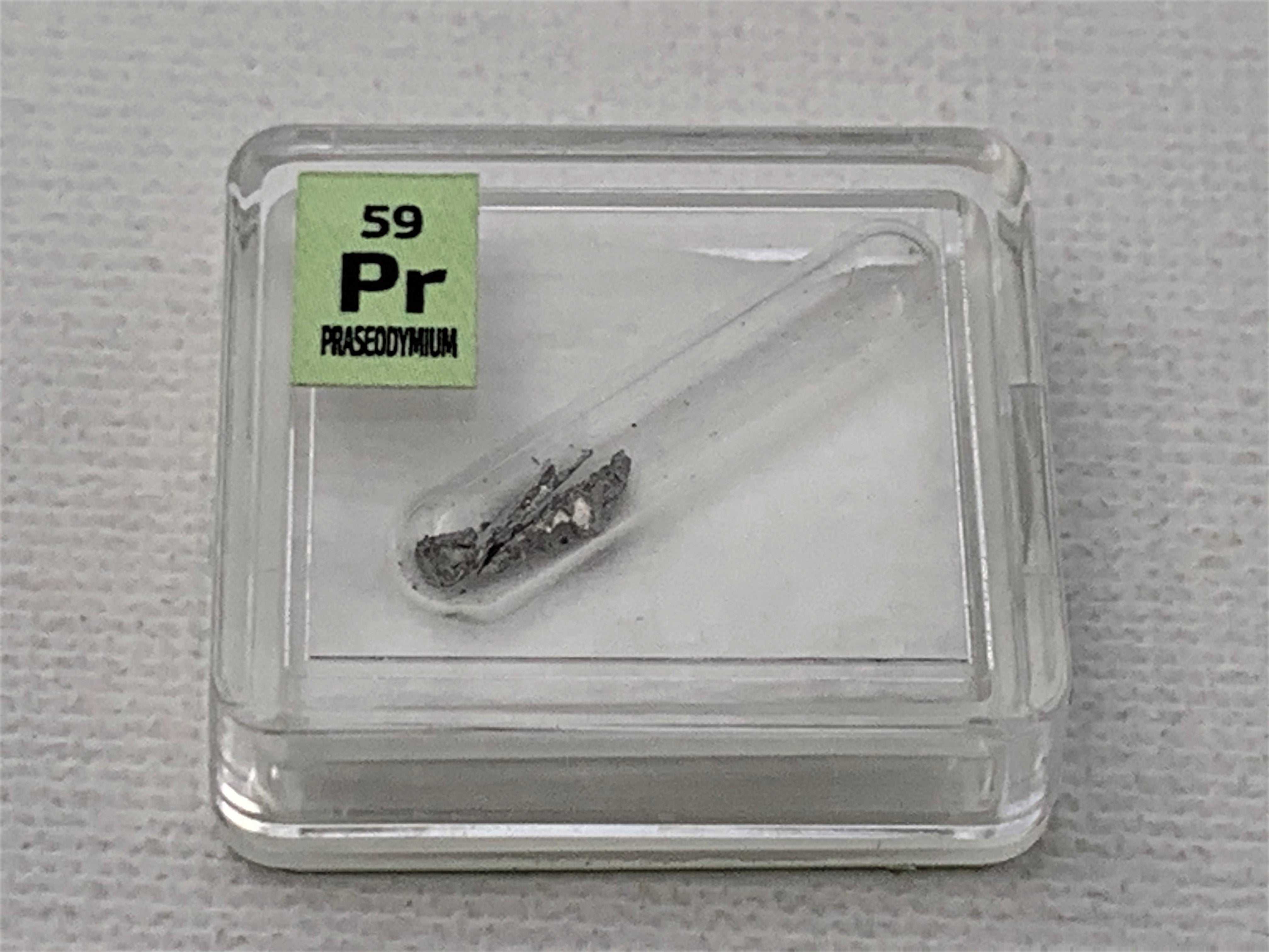 Praseodymium Metal in Glass ampoule under argon, Clean and Shiny  99.9% in a Periodic Element Tile