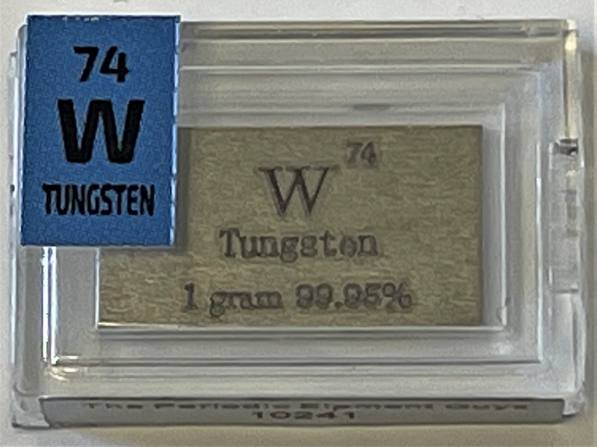 Tungsten Metal 1 Gram Ingot Bullion 99.95% in a labeled Periodic Element Tile