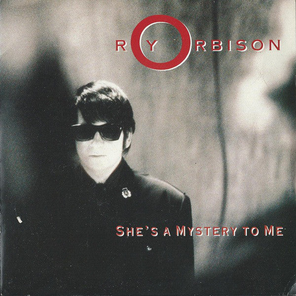 Roy Orbison : Shes A Mystery To Me (7, Single, Cor) 0