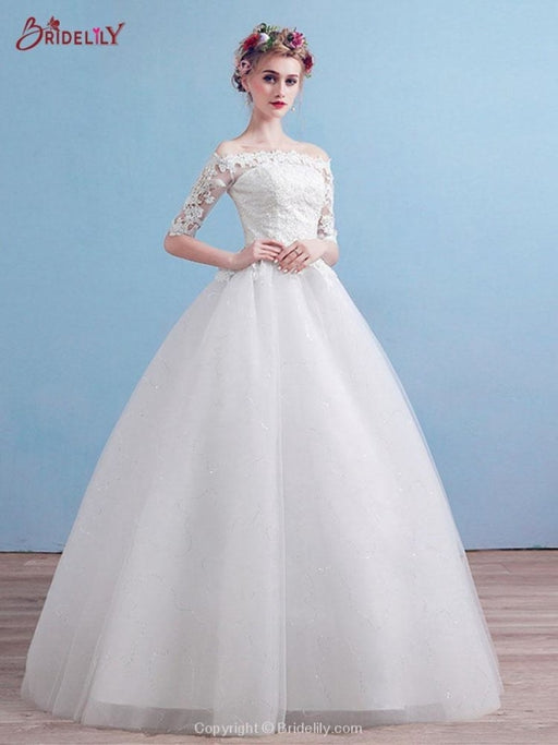 https://cdn.shopify.com/s/files/1/0255/9282/3901/products/elegant-off-the-shoulder-long-sleeves-lace-ball-gown-wedding-dresses-425_512x683.jpg?v=1630022435