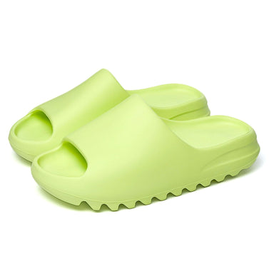 glow green yeezy slides glow in the dark