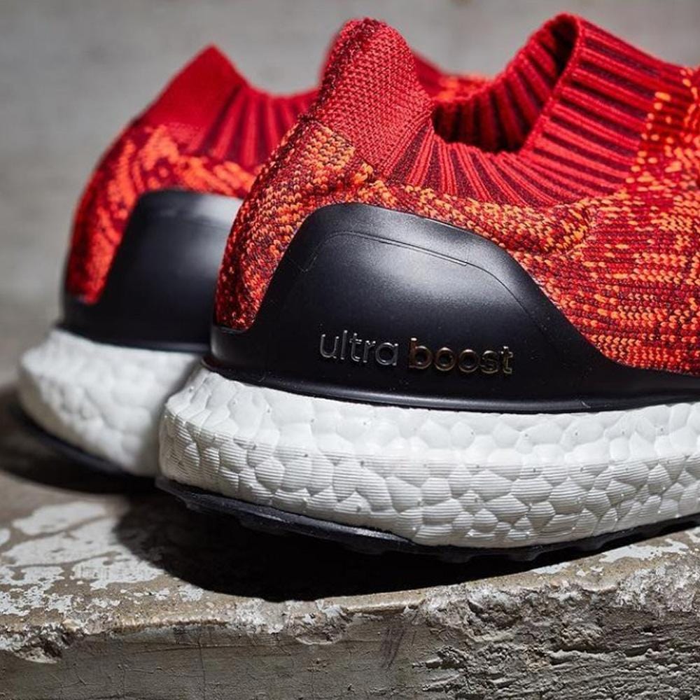 ultra boost uncaged solar red