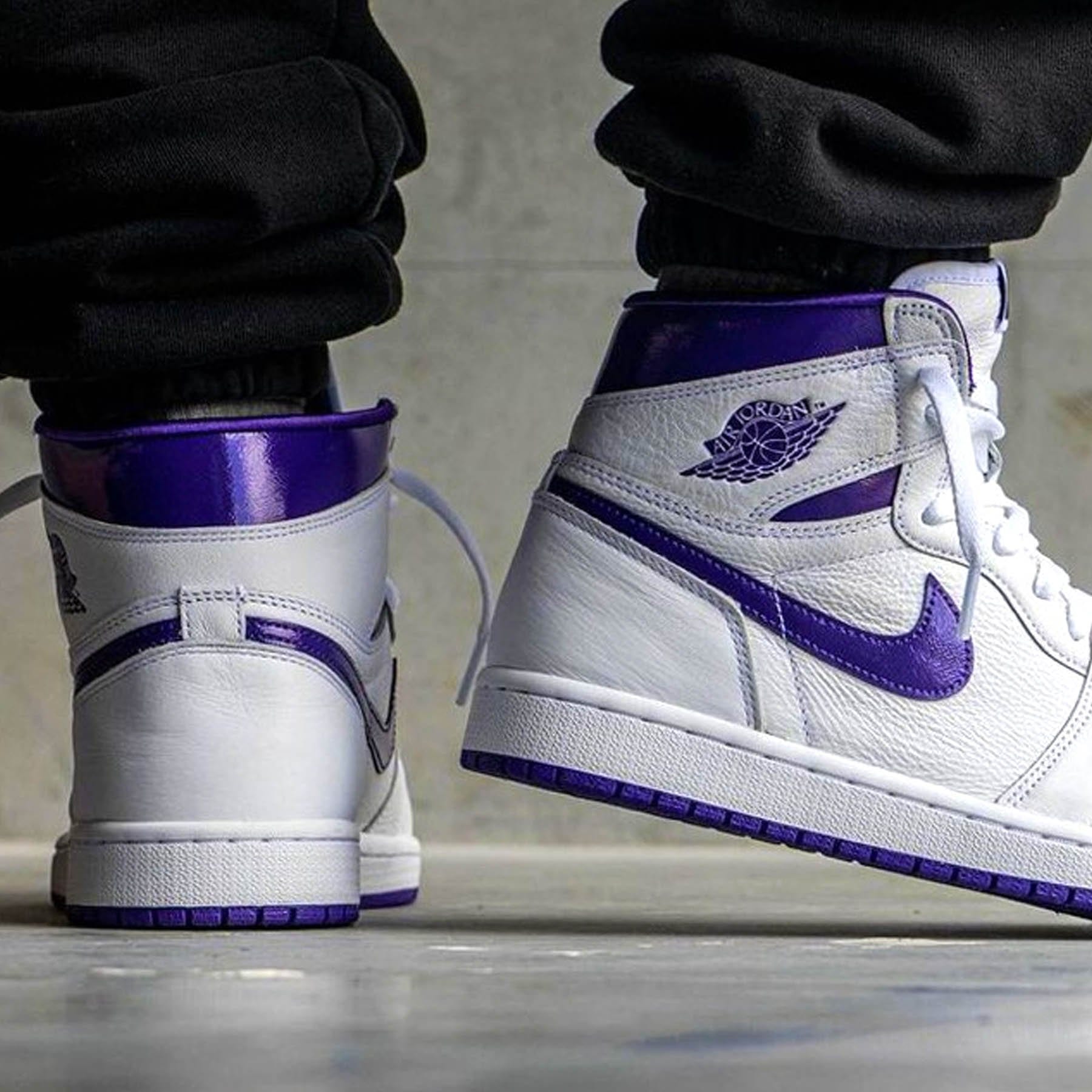 all white and purple jordans