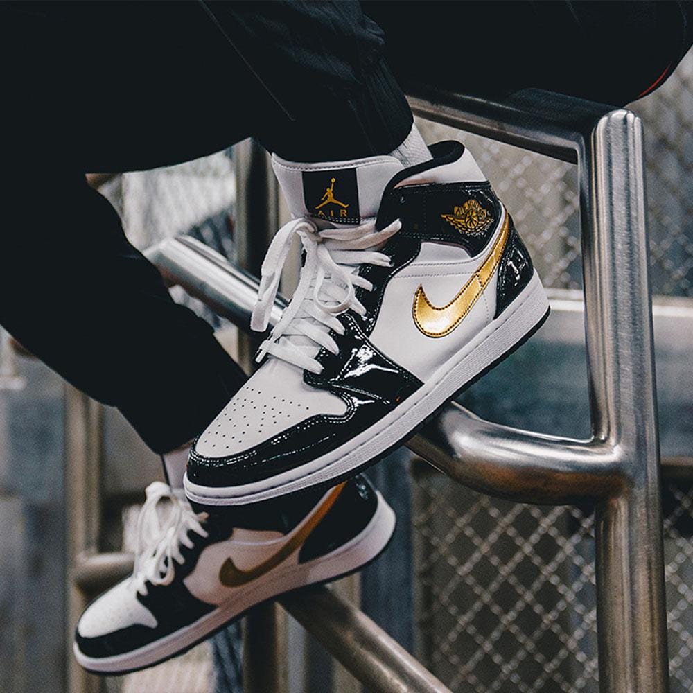 gold and black patent leather 1s