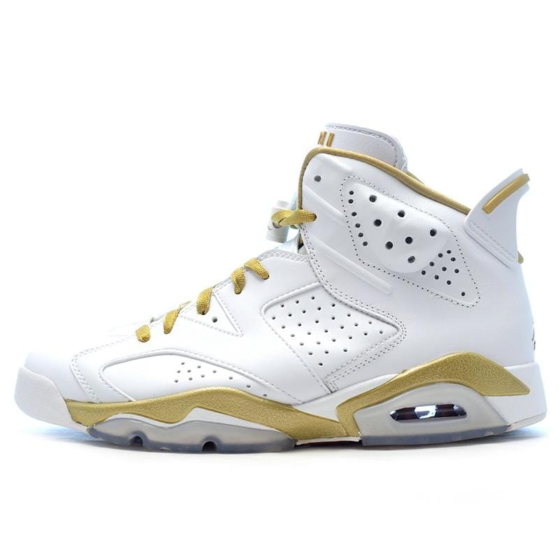 golden and white jordans