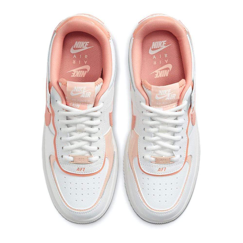 white and pink air force ones