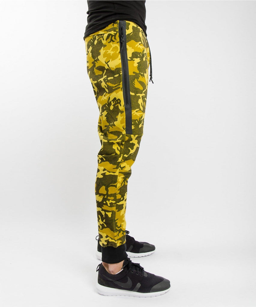 nike tech fleece pants yellow