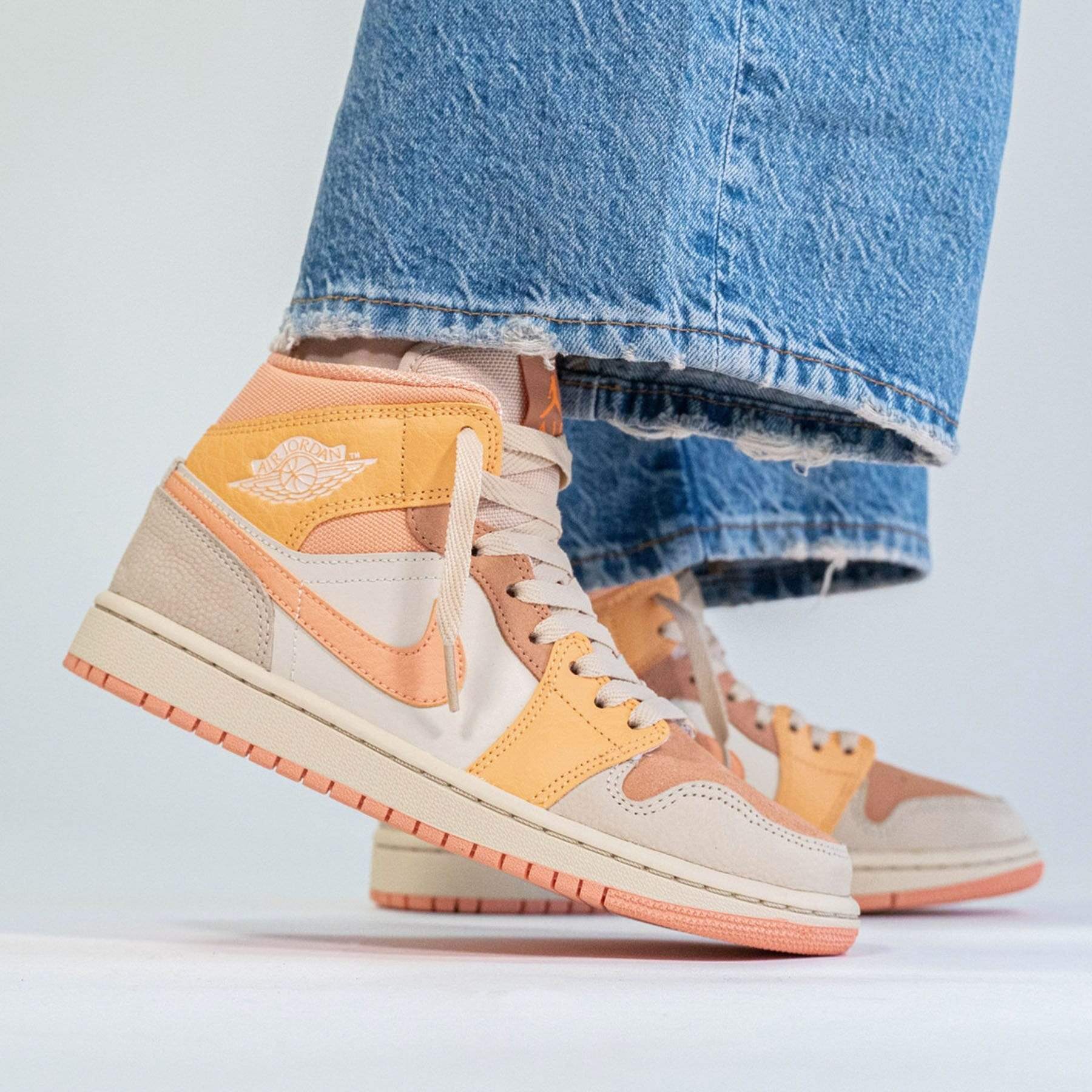 jordan 1 mid apricot womens orange stores