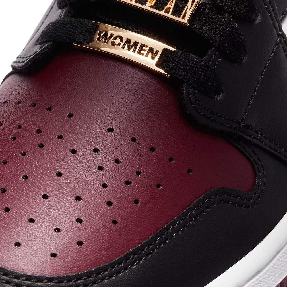 gold and burgundy jordans