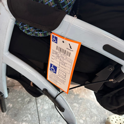 Airport wheelchair assistance gate tags