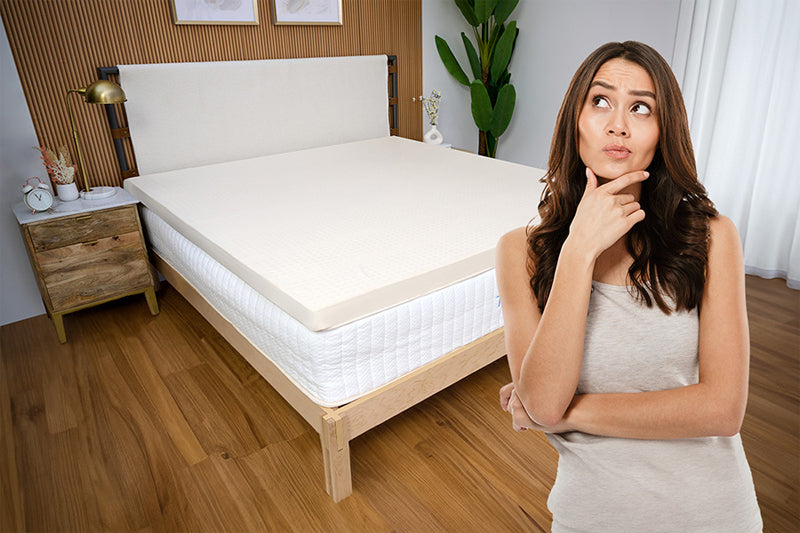 A women thinking about whether it is important consider mattress topper thickness