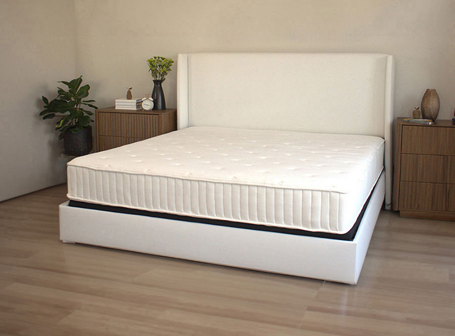 Hybrid mattress with memory foam layer for memory foam feel