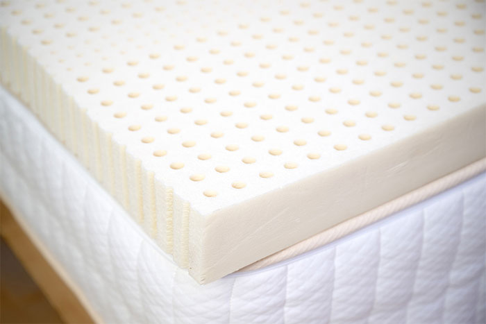 Use a mattress topper or pillow top for optimal comfort