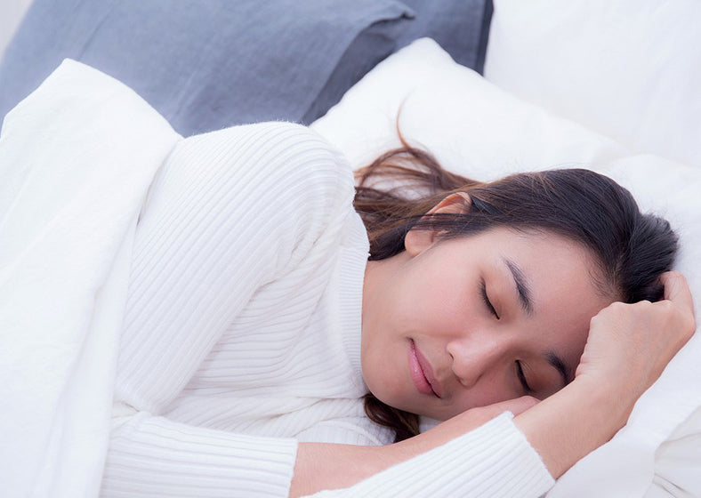 a woman sleeping on the best mattress for side sleepers