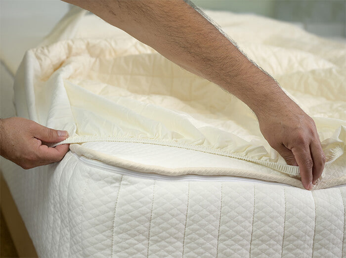 Deep pocket mattress pad as extra layer for plush comfort