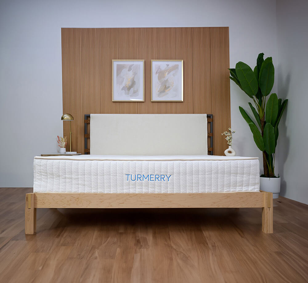 Organic mattress on solid surface natural wood bed frame
