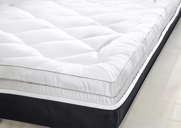 Feather Mattress Pad on king size guest bed to rest easy
