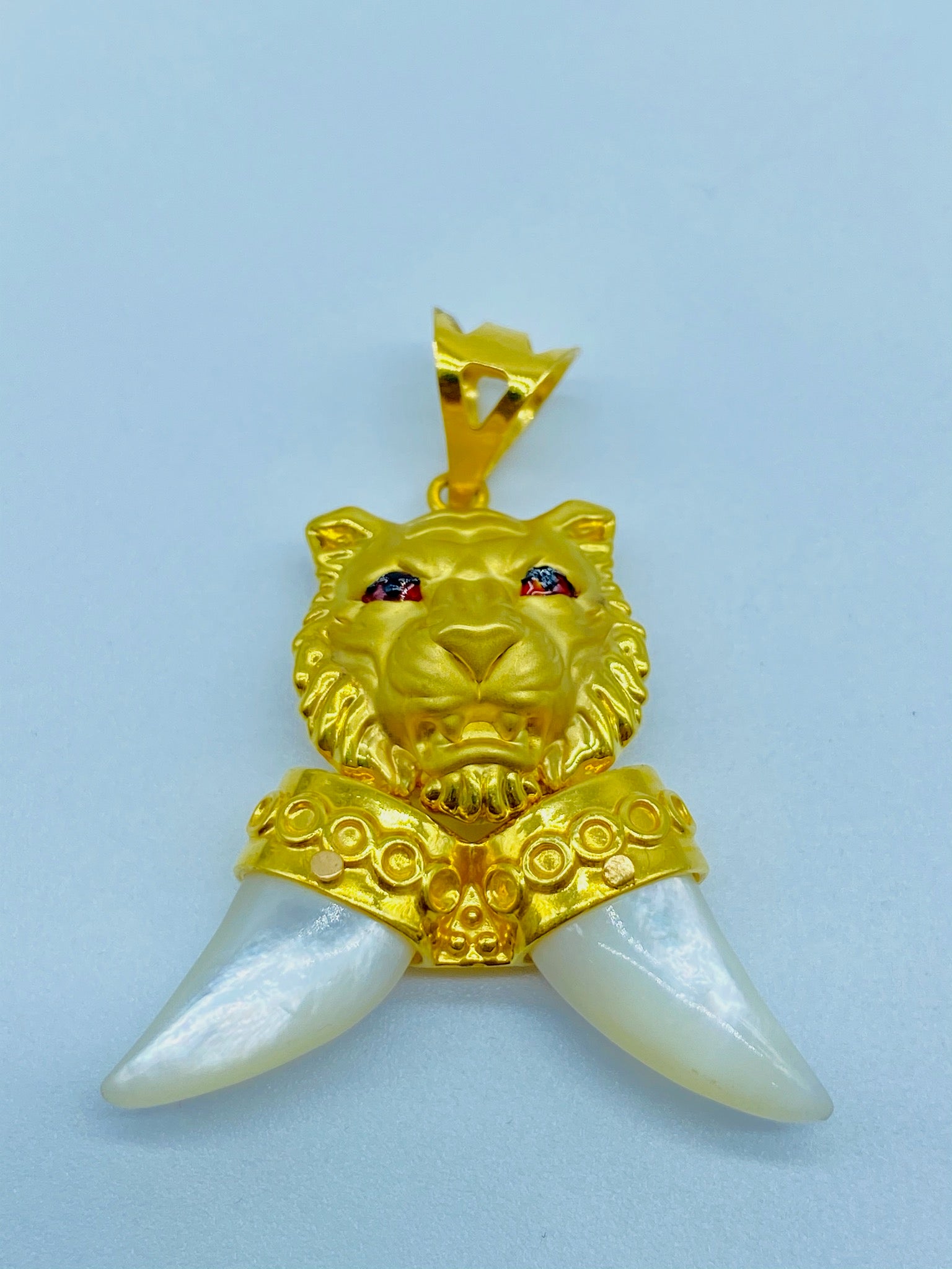 lion tooth gold necklace