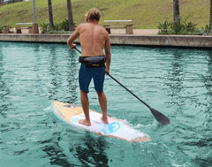 Stand Up Paddle boarder with waist pack