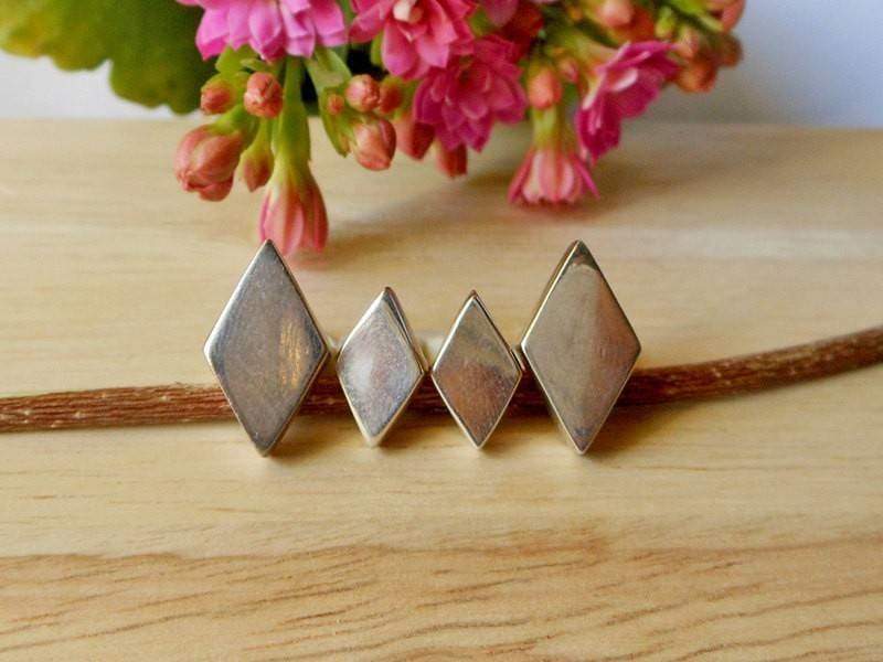 Silver 3D Yeah Triangle Huggie Earrings