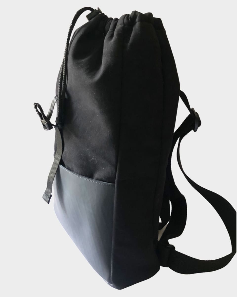 https://cdn.shopify.com/s/files/1/0256/0717/6266/products/rucksack-handmade-rimagined-discovered-299.jpg