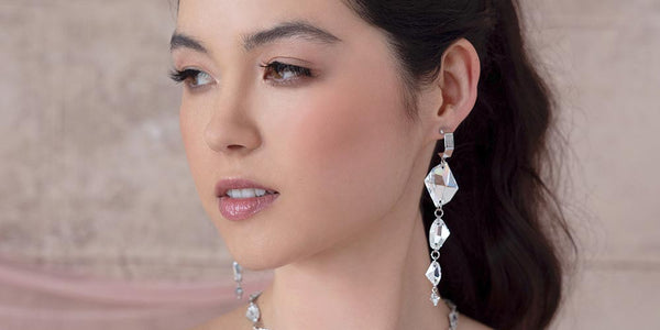 Sza statement earrings for low v neckline dress