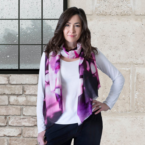 lady in white top wearing purple leaves cashmere merino wool scarf