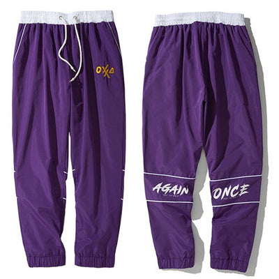 black and purple sweatpants