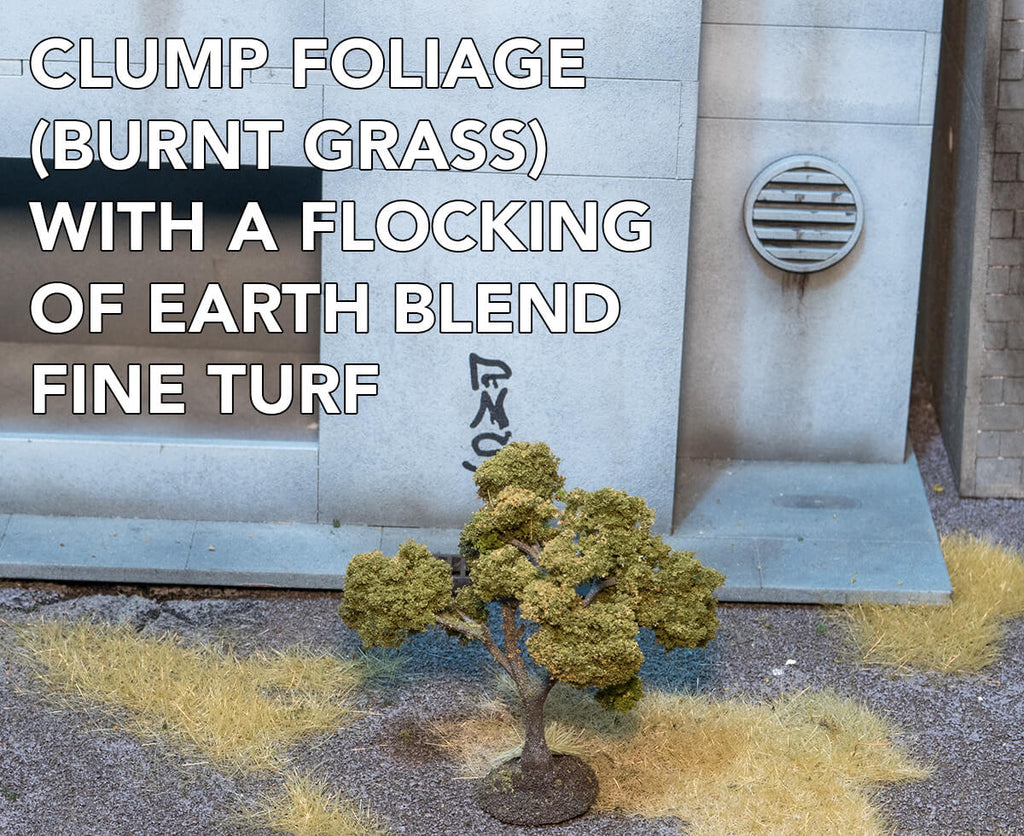 Woodland Scenics Clump Foliage (Burnt Grass) applied to tree armature. Terrain and miniatures are shown for scale.