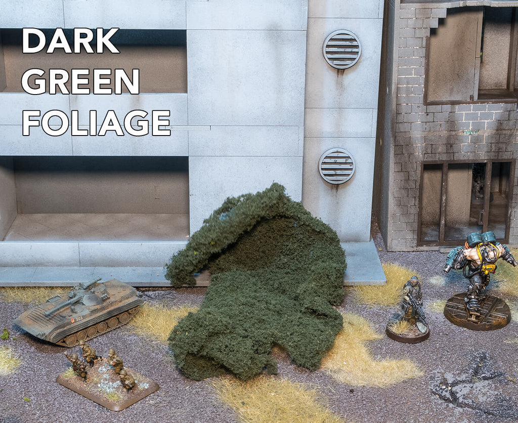 Woodland Scenics Dark Green Foliage. Terrain and Miniatures are shown for scale.