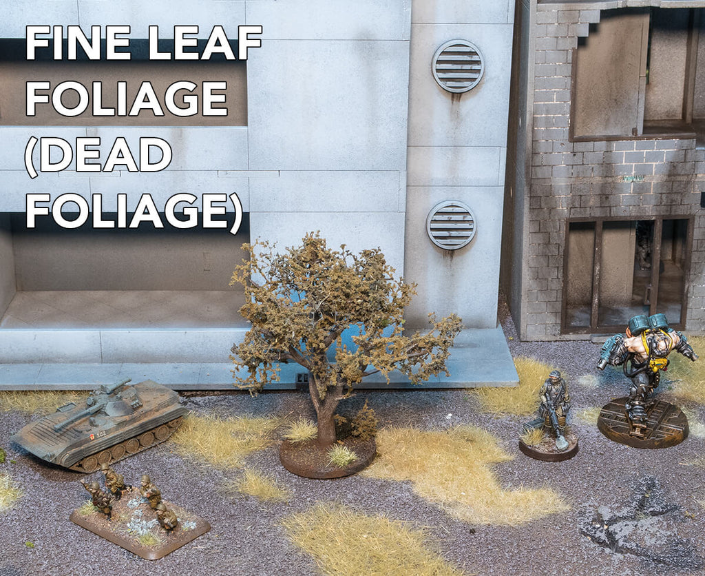 Woodland Scenics Fine Leaf Foliage Dead Foliage applied to Tree Armature. Miniatures and terrain are shown for scale.