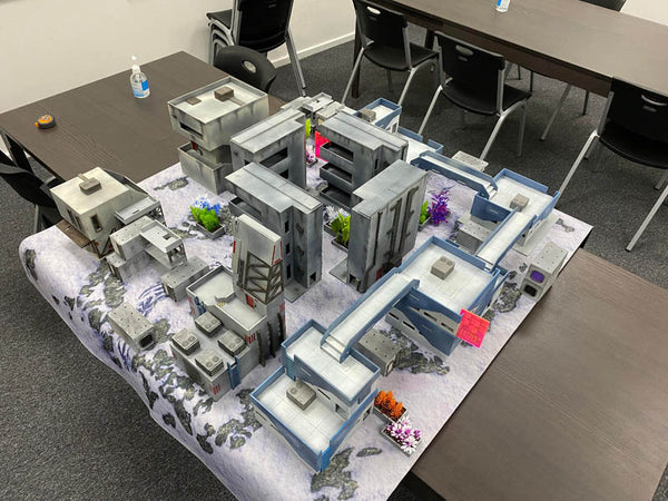 Infinity urban terrain with lab buildings connected by bridges in a winter setting