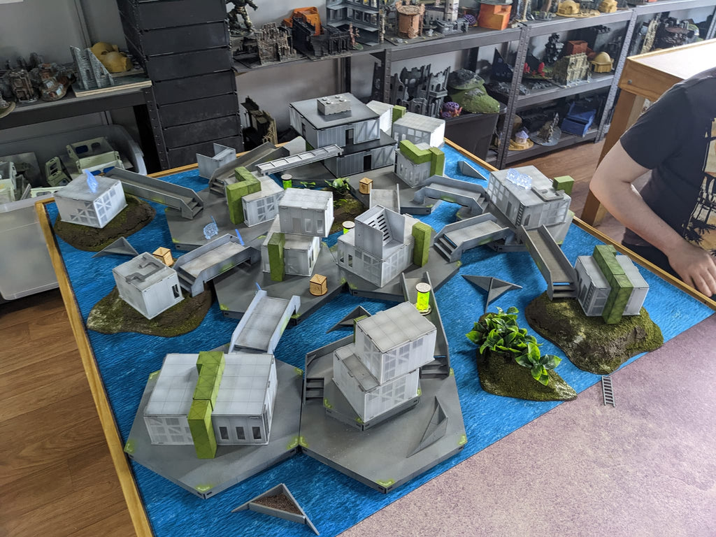 Angled photo of infinity aquatic terrain in a games store