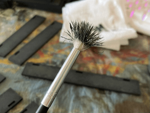 Small cheap and flayed paintbrush for stippling