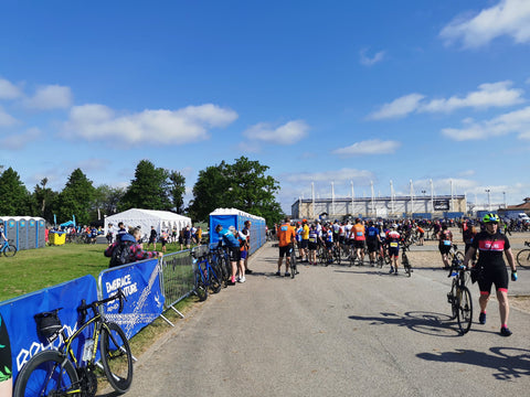 cycling race banners showing rehook logo. Heading to the pens for the start of the race 