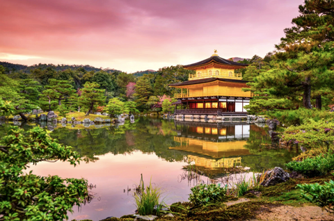 yellow Japanese house on a lake