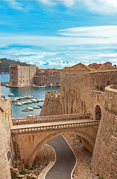 Croatia old stone city on the water with boats