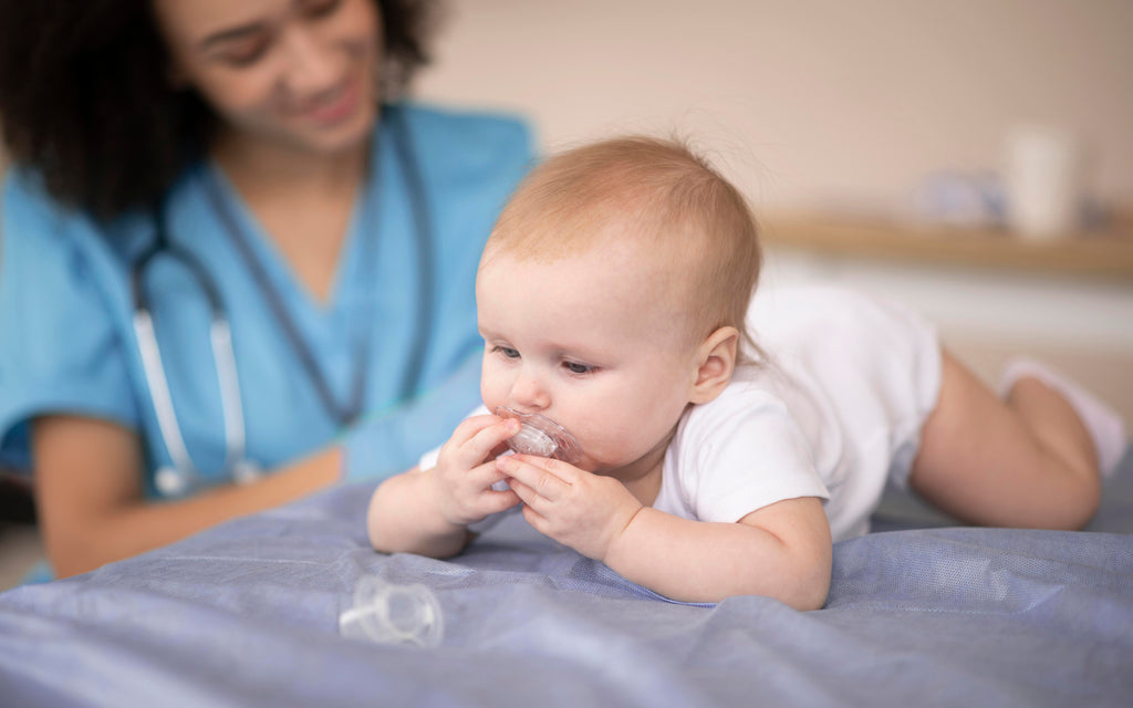 A little baby being health clinic vaccination