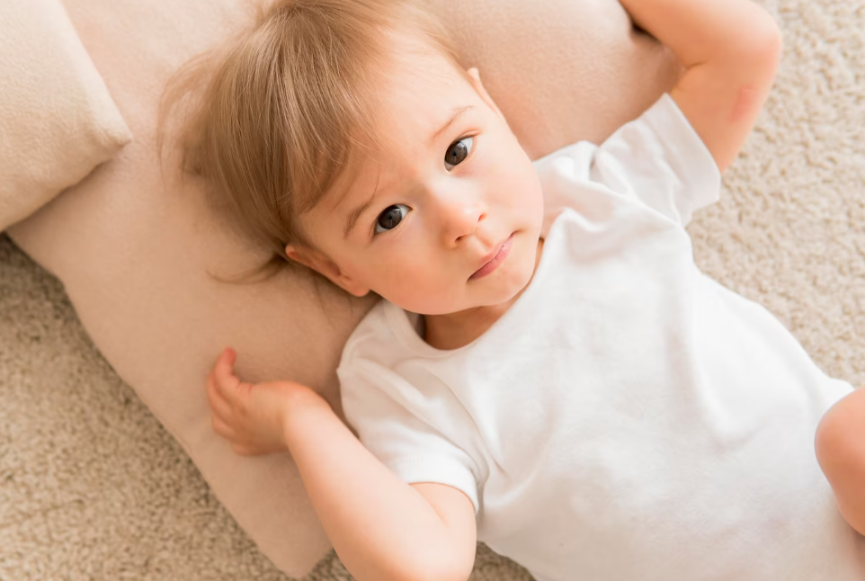 Toddler lying on the pillow
