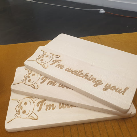 Cat laser cut design chopping boards saying "I'm watching you"