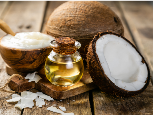 Image of coconut oil with coconuts