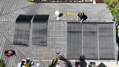 installation of solar pool heating panels on roof