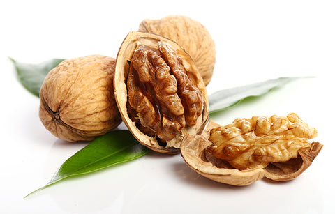Image of walnuts, one cracked open