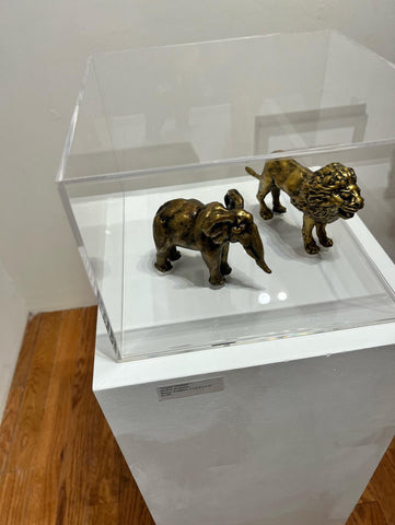 Michele Benjamin Elegant Elephant and Joyful Lion Bronze Sculptures on view at Pictor Gallery at Pictor Gallery "Downtime" Summer Invitational through August 5, 2023. 