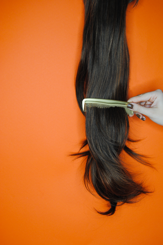 Combing through hair