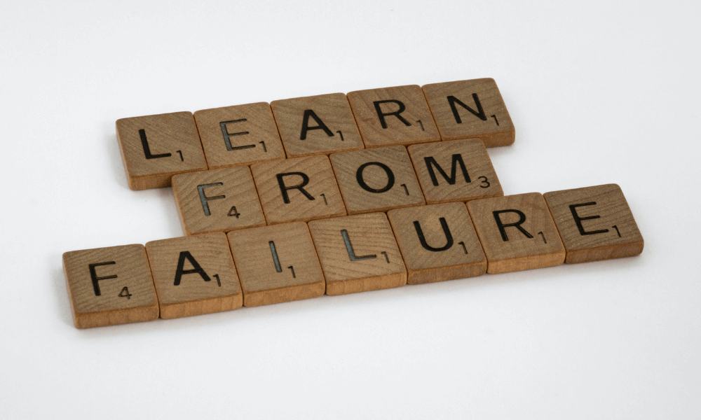 Image of Scrabble letters on a white background spelling out Learn From Failure