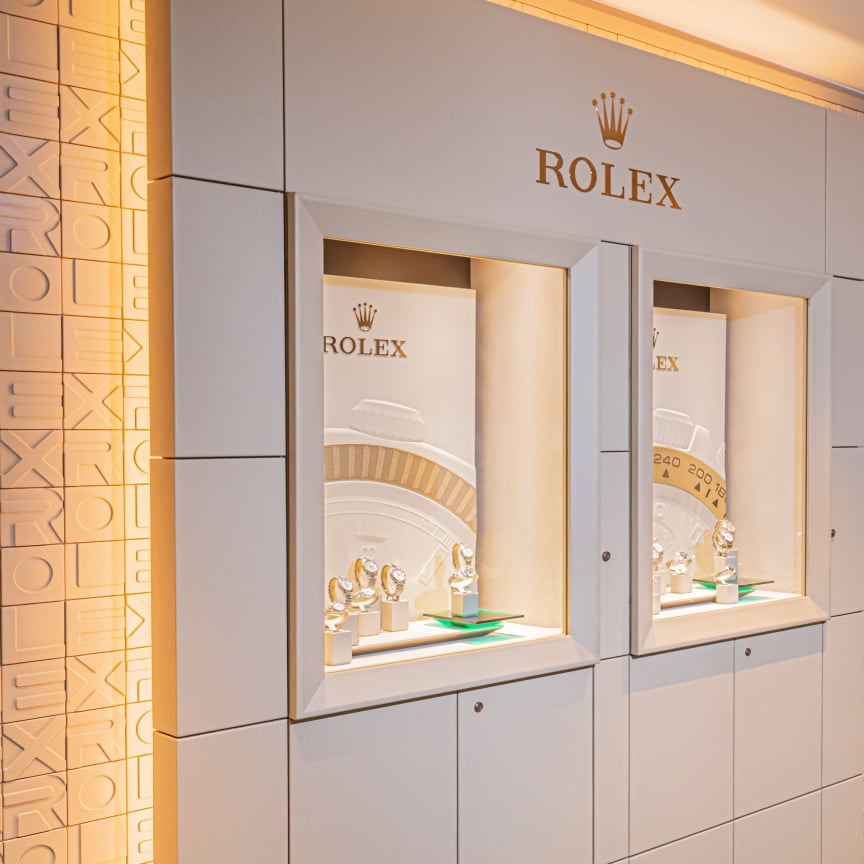 Rolex showroom image displaying the Rolex watches in the display case