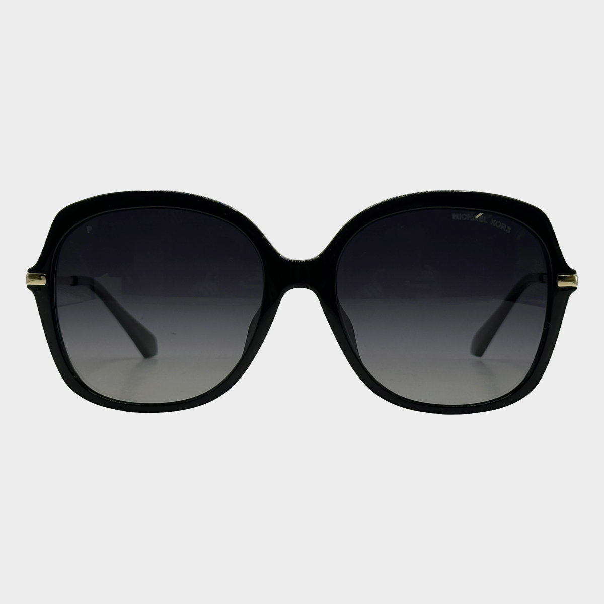 Image of Michael Kors women's black rounded sunglasses with gold tone hardware